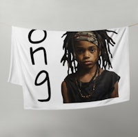 a boy with dreadlocks on a towel hanging on a clothesline